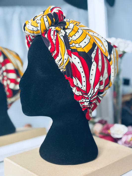 Bonnet foulard avec noeud en forme de pompom Jaune & Rouge | Fleurs